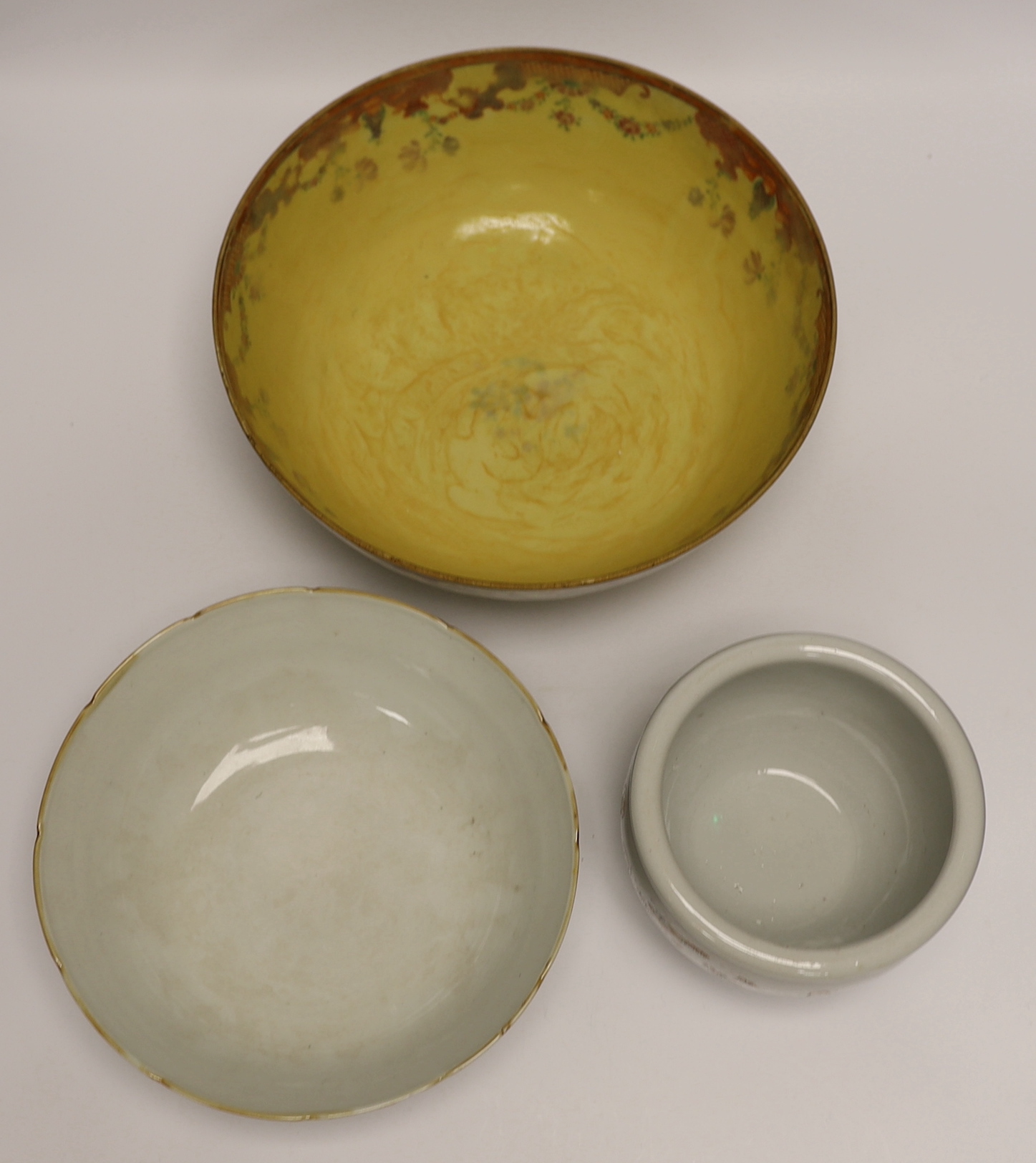 Two Chinese famille rose bowls and a small jardiniere